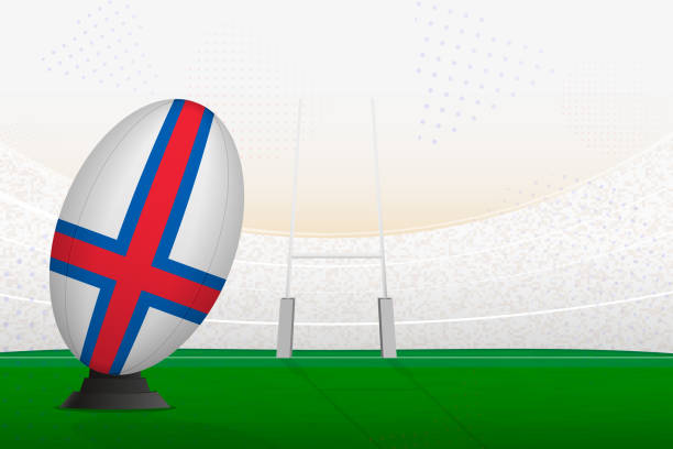 istock Faroe Islands national team rugby ball on rugby stadium and goal posts, preparing for a penalty or free kick. 1575951031