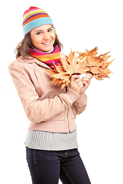 istock Young female holding tree leaves 157596450