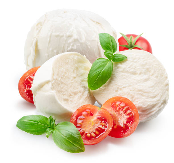 istock Mozzarella with tomatoes and basil leaves isolated on white background. 1575979156