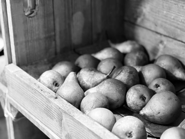 A tray of pears for sale