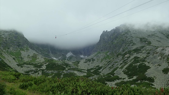 Time Lapse Cable Car And Cloudy Mountains