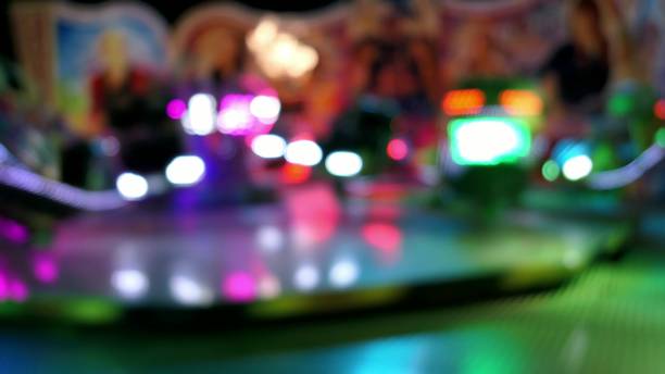 istock Carousel Ride In Amusement Park Bokeh 1576008904