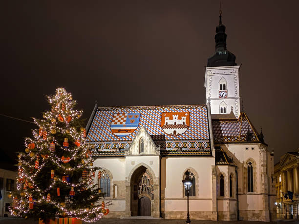 istock St. Mark's church in Zagreb, Croatia with Christmas tree at night 1576011067