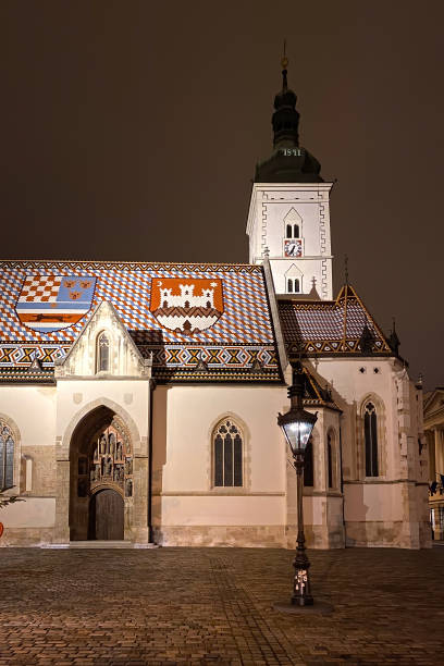 istock Illuminated St. Mark's church in Zagreb, Croatia 1576012129