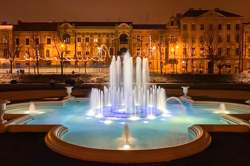 Long exposure of illuminated Fountain of King Tomislav (croat. Fontana kralja Tomislava) in Zagreb, Croatia in winter at night