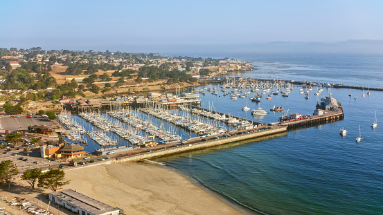 Aerial view of wharf and Del Monte Beach in Monterey, California, USA.