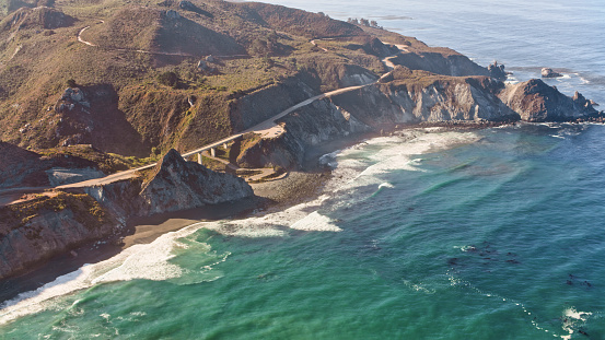 Aerial view of Cape San Martin on Big Sur coast during sunny day, California, USA.
