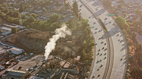 Aerial view of factory nearby highway in Hannah-Green neighbourhood of San Jose, California, USA.