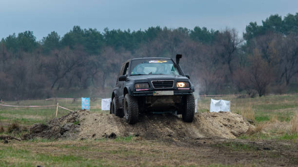 istock Off Road vehicle in the action in dirt 1576017164