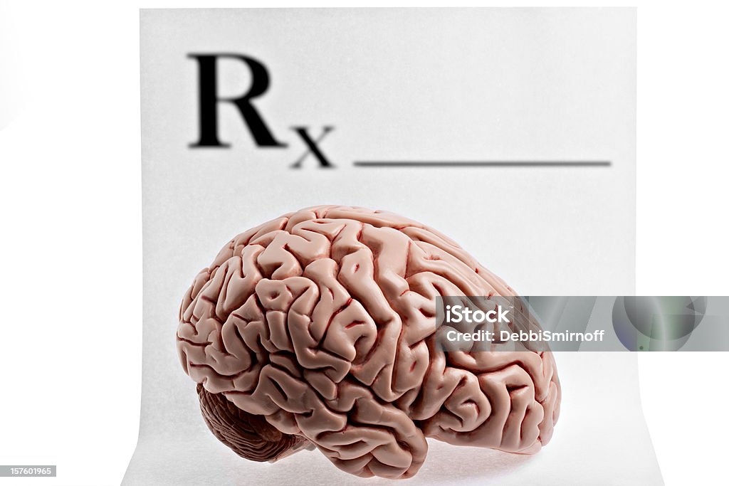 Prescription Brain A brain sitting on textured paper with out of focus Rx on it. What will the Doctor prescribe? Available in XXXLarge.PLEASE CLICK HERE FOR MORE BRAINS. Brain Stock Photo