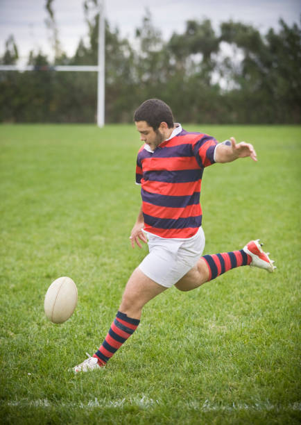 istock Rugby Player Kicking a ball 157602036