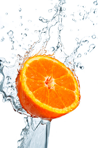 Splashing citrus with a white background.