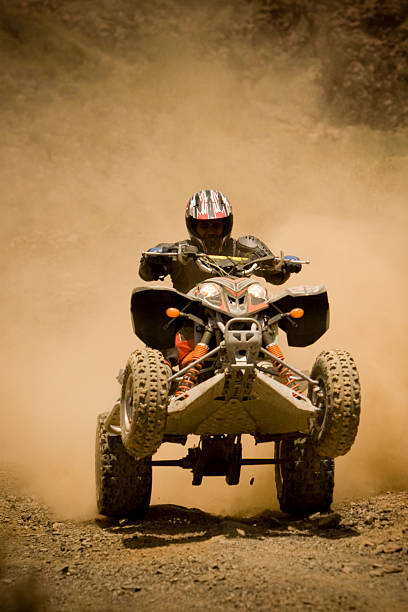 atv wheelie - off road vehicle quadbike quad racing motocross photos et images de collection