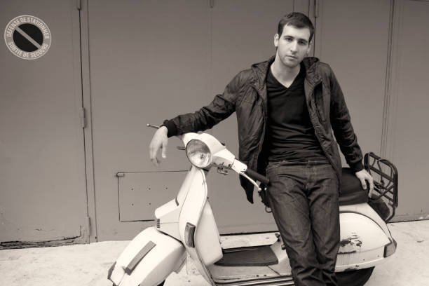 istock Defiant Young Man on Vespa in No Parking Zone 157603068