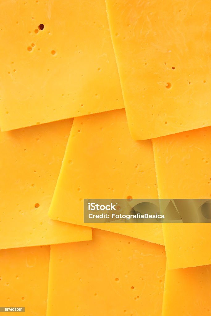 Fatias de queijo Cheddar - Foto de stock de Queijo royalty-free