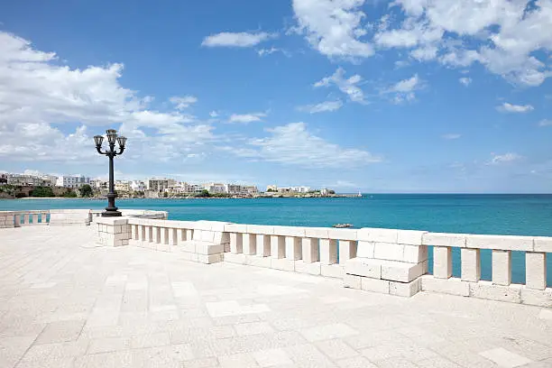 Otranto Seafront (Lecce, Apulia - Italy). The city is located on the east coast of the Salento peninsula. The Strait of Otranto, to which the city gives its name, connects the Adriatic Sea with the Ionian Sea and Italy with Albania. The harbour is small and has little trade.