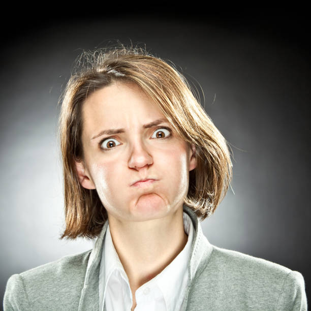 istock girl portrait on grey background 157603519