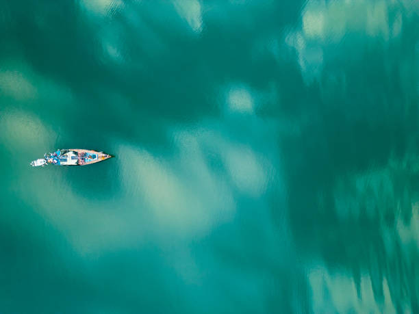 istock Boat from above with watercolour background 1576036328