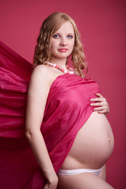 istock Pregnant Woman Wrapped in Fabric 157603772