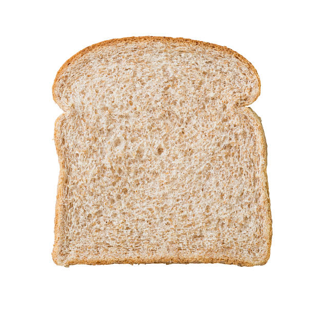 Multigrain bread slice A slice of bread isolated on white whole wheat stock pictures, royalty-free photos & images