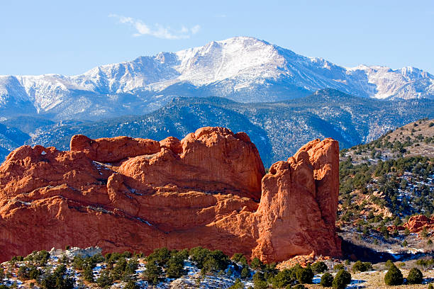 Pikes Peak and Garden of the Gods Colorado Springs Snow covered Garden of the Gods Park in Colorado Springs at the base of 14000 foot Pikes Peak in the wintertime. colorado springs photos stock pictures, royalty-free photos & images
