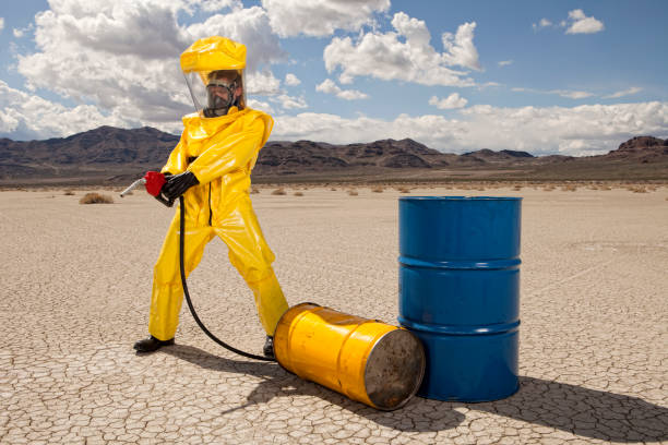 istock Man in hazmat suit causing an oil spill 157605681