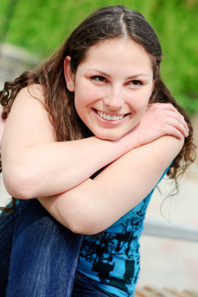 istock Smiling happy young woman in sunny day 157605718