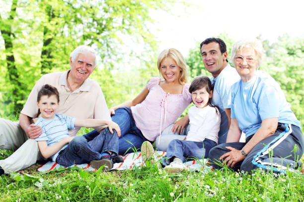 istock Happy family relaxing together on nature. 157605764