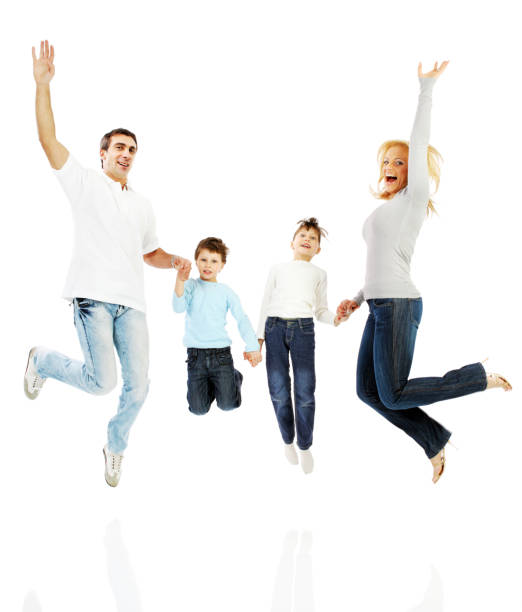 istock Happy family jumping together 157605772