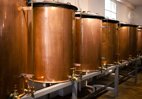 Barrels of essences at perfume manufacturing center