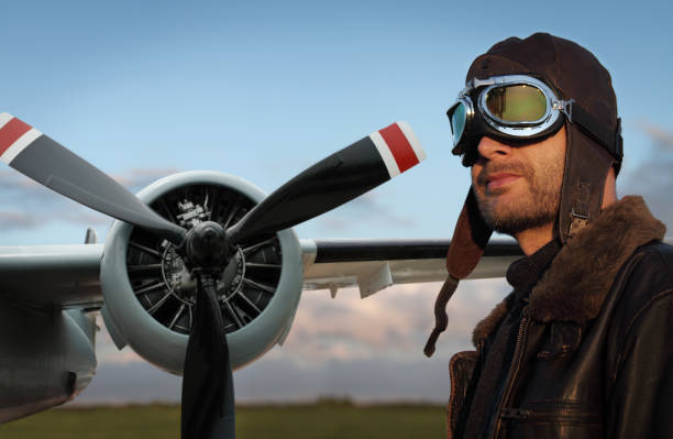 Pilot and Detail of Airplane Propeller Engine in Retro Style, Focus on the Man, Photomontage. SEE my other similar photos: 