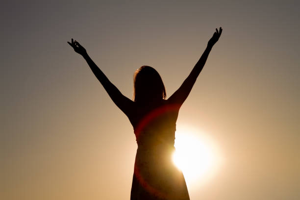 istock Pretty Native American Girl Silhouette Arms Raised 157605912