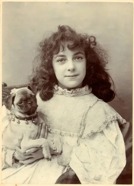 Photo of Victorian Girl and her Dog