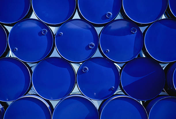 Industrial Barrels Stacked blue barrels at chemical industry drum container stock pictures, royalty-free photos & images