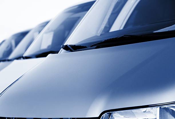 istock Blue metallic vans in a row at dealership 157606358