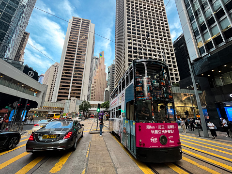 Traditional Hong Kong trams called Ding Ding. Local public transport. Very cute double-decker trams. Used heavily by locals and tourists. Quick transportation in Hong Kong