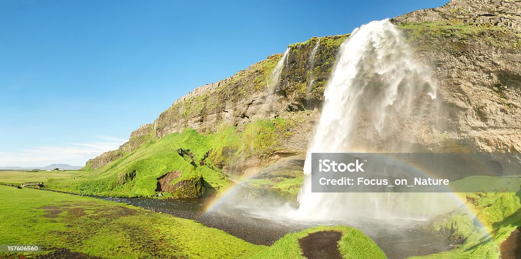 Cachoeira de Seljalandsfoss - Foto de stock de Arco-íris royalty-free