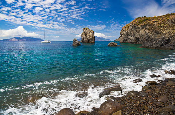 Cala Junco - small bay of Panarea - one of Aeolian Islands near Sicily (Italy). Lipari and Salina islands visible on the horizon.