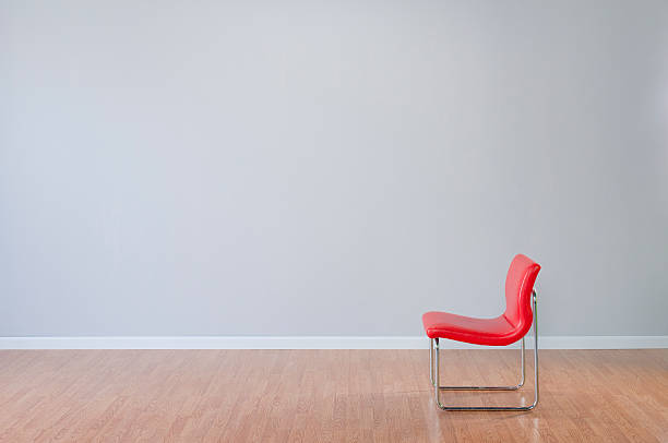 istock Retro Red Chair In Empty Room 157607466