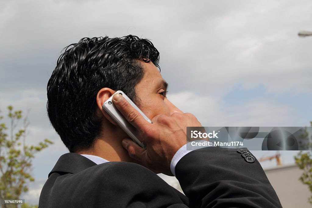 Hombre en el teléfono - Foto de stock de Afrodescendiente libre de derechos