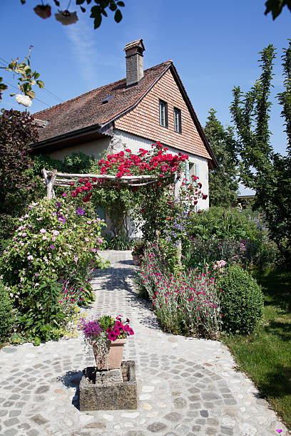istock Swiss Farmhouse with Floral Walk 157607654