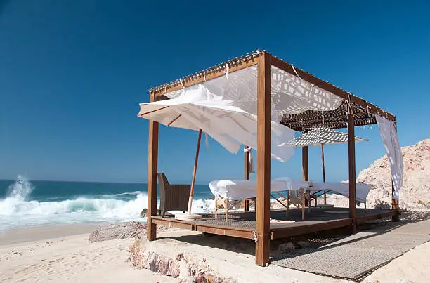 Outdoors Seaside couple's massage cabana setup at a resort. Photo taken in Los Cabos, Mexico.