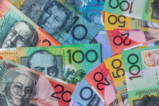 istock Australian dollar banknotes on wooden background, close up 1576082228