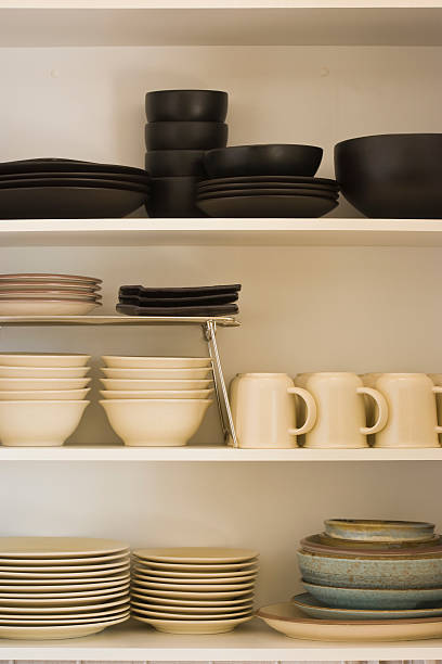 istock Kitchen cabinet with black and white dishes 157608278