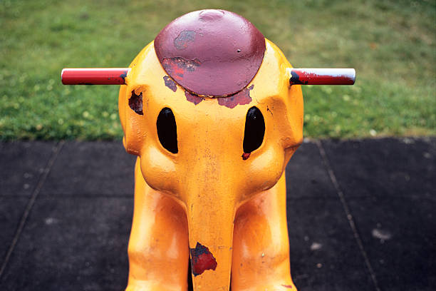 Little elephant to ride at the playground. Shallow depth of focus. 