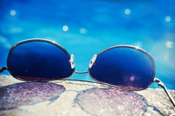 istock Dark Stylish Sunglasses, Swimming Pool 157609103