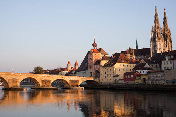 Steinerne Brucke's lake and bridge, Regensburg stock photo