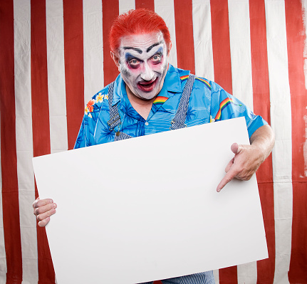 Male Clown With Empty Sign
