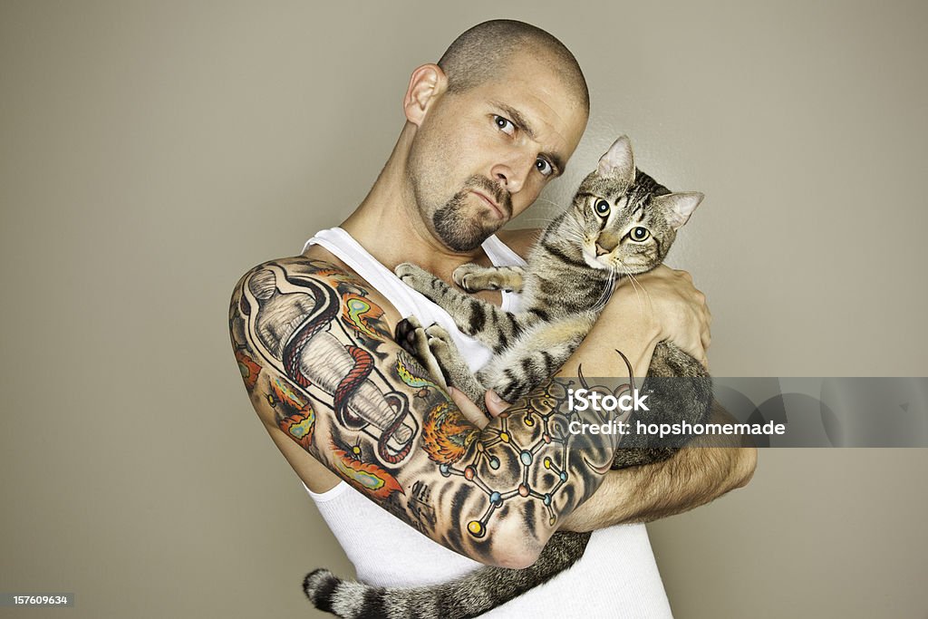 Mann und Katze - Lizenzfrei Männer Stock-Foto