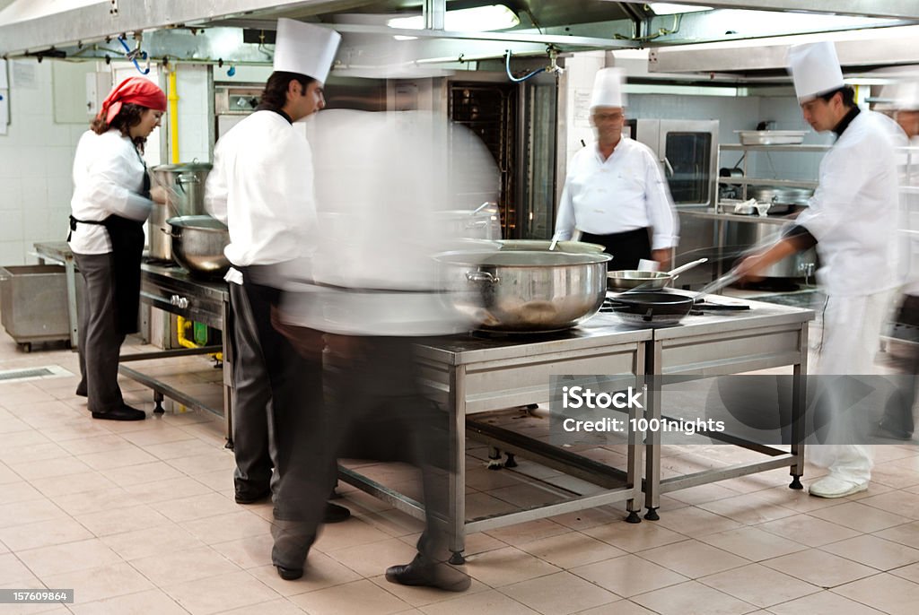 Working chefs Working chefs at the cuisine Adult Stock Photo